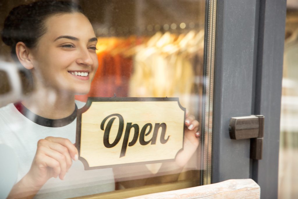 Small business owner reviewing commercial insurance